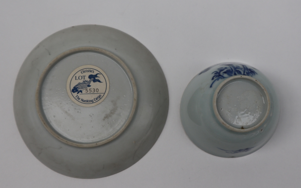 A Chinese Nanking Cargo blue and white porcelain tea bowl and saucer decorated with a tree and - Image 3 of 6