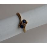 A sapphire and diamond ring,