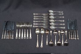 An Elizabeth II silver Kings pattern flatware service comprising six soup spoons,