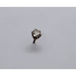 A diamond stud earring, approximately 0.