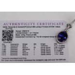 Gemporia - An platinum tanzanite and diamond Lorique pendant, set with a 7.