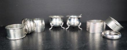 A pair of George V silver cauldron table salts on three leaf capped legs, Chester, 1911,