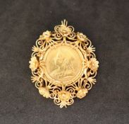 A Victorian gold sovereign dated 1893, in an unmarked yellow metal mount,