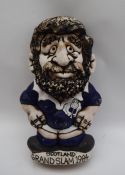 A John Hughes pottery Grogg of a Scottish player with no 6 to the reverse,