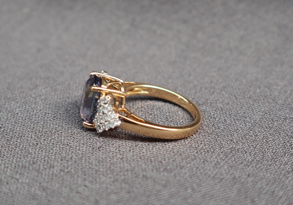 Gemporia - An 18ct gold tanzanite and diamond Lorique ring, set with an oval cut tanzanite, - Image 2 of 4