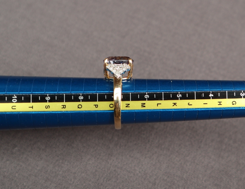 Gemporia - An 18ct gold tanzanite and diamond Lorique ring, set with an oval cut tanzanite, - Image 4 of 4