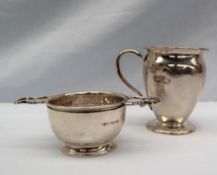 A George V silver christening mug, of tapering form on a spreading foot, inscribed "Jack Dec 1927",