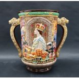 A Royal Doulton twin handled loving cup to celebrate the Silver Jubilee of her gracious Majesty