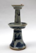 A Qianglong Qing Dynasty candlestick, with central drip tray, decorated with a dragon, 17.