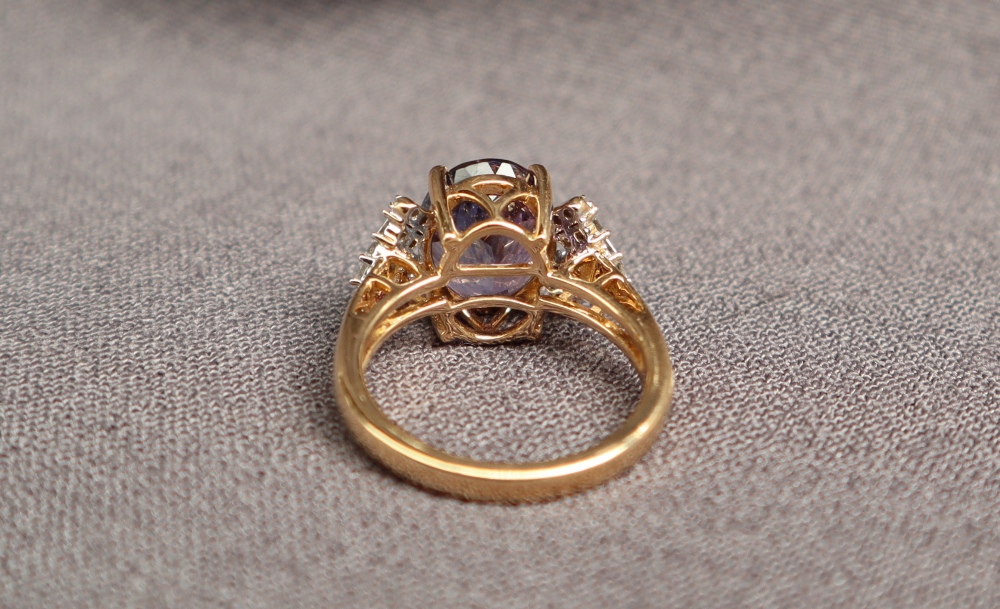 Gemporia - An 18ct gold tanzanite and diamond Lorique ring, set with an oval cut tanzanite, - Image 3 of 4