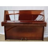 A Steinway & Sons Model Z upright piano, circa 1972, in a lacquered mahogany case, No.