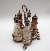 A George V silver married cruet, with five bottles, various dates,