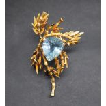 An 18ct gold aquamarine brooch,