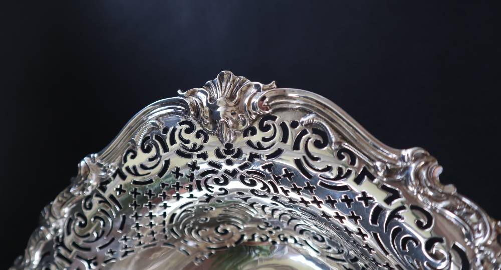 A George II silver cake basket, of pointed oval form, the border pierced with scrolls and leaves, - Image 8 of 8