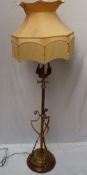 A copper and brass standard lamp,