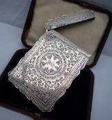 A Victorian silver card carrying case, engraved with scrolling leaves and personalised "Polly",