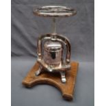 A Birmingham Silver Plate Ltd electroplated duck press, with a five spoked turning wheel,