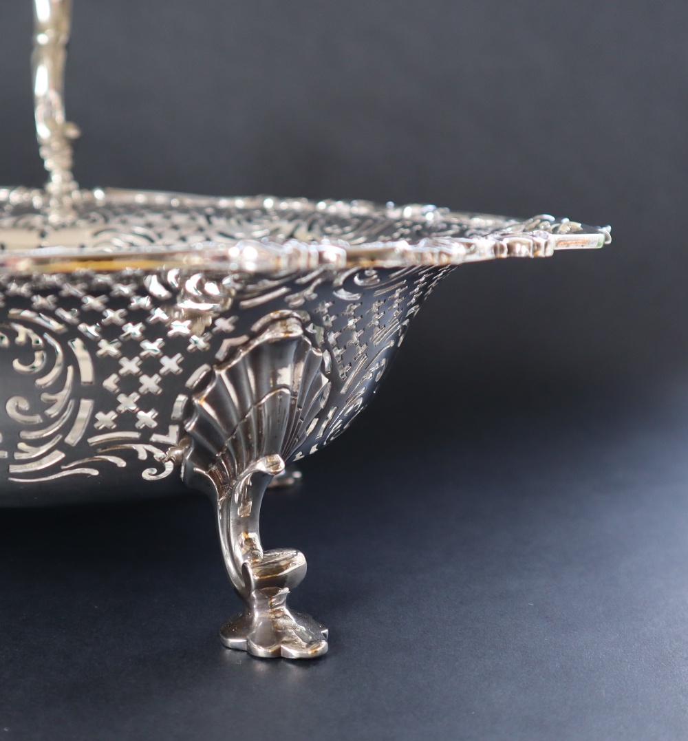A George II silver cake basket, of pointed oval form, the border pierced with scrolls and leaves, - Image 7 of 8