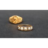 An 18ct gold ring set with five graduated half pearls, size P 1/2, approximately 3.