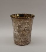 A 19th century Danish silver beaker, of flared cylindrical form, with Greek key pattern,
