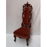 A Victorian walnut nursing chair,