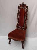 A Victorian walnut nursing chair,