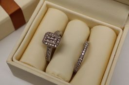 A 9ct gold diamond cluster ring of rectangular form,