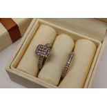 A 9ct gold diamond cluster ring of rectangular form,