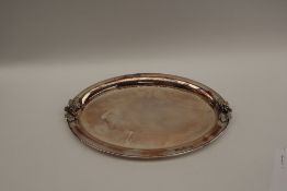 A modern silver dish of oval form with grape and leaf applied decoration, London, 1999,