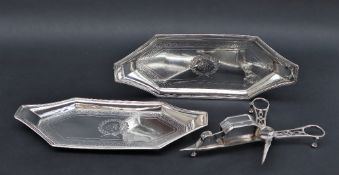 A matched pair of silver George III snuffer trays with bright cut decoration, by Thomas Wallis,