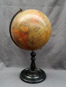 A "Geographia" 10 inch Terrestrial Globe, on a turned ebonised base,