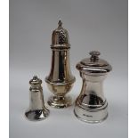 An Elizabeth II silver sugar caster, with a pointed finial, pierced domed cover,