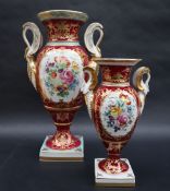 A Le Tallec Paris porcelain twin swan handled vase painted with garden flowers to a red ground with