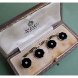 A set of Asprey 18ct gold and platinum shirt studs,