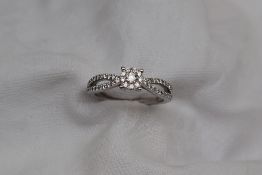 Gemporia - A platinum diamond cluster ring,