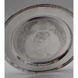 An Elizabeth II silver, Silver Jubilee commemorative plate, makers Roberts & Dore Ltd, London 1977,