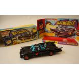 A Corgi Toys rocket firing Batmobile with Batman and Robin, No.