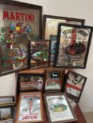 A collection of advertising mirrors, including Martini, Southern Comfort, Rolls Royce,