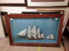 A Diorama of two ships on the open sea, in a glass fronted case, 96 x 61.