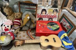 Teddy bears together with an abacus, ukelele, Escalado game, Identipops,