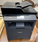 A Brother DCP-L5500DN mono laser printer (sold as seen,