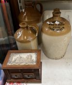 Three stoneware storage jars together with a jewellery box