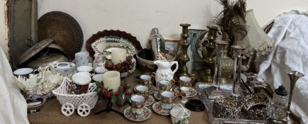 A silver bud vase together with continental white metal bottle coasters, candlesticks,