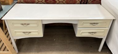 A modern dressing table with four drawers on octagonal legs