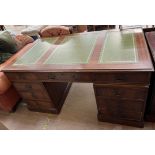 A 20th century mahogany pedestal desk,