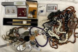 Assorted costume jewellery including beaded necklaces, wristwatch,