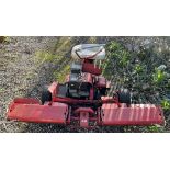 A ride on lawn mower with three wheels and Briggs and Stratton engine (Sold for spares)