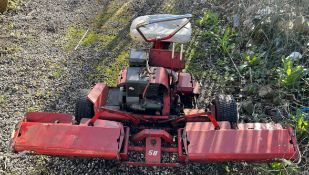 A ride on lawn mower with three wheels and Briggs and Stratton engine (Sold for spares)