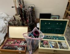 A large quantity of costume jewellery including rings, bracelets, necklaces,