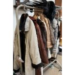 A Regency furs coat together with a collection of fur coats and stoles etc